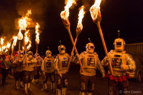 A squad of torch-wielding robots featured in the procession at Uyeasound Up-Helly-Aa. Photo: John Coutts