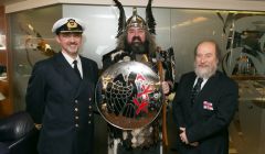 Lerwick lifeboat representative Brucie Leask (right) receives the Lerwick jarl squad plaque. Photo: Ben Mullay.