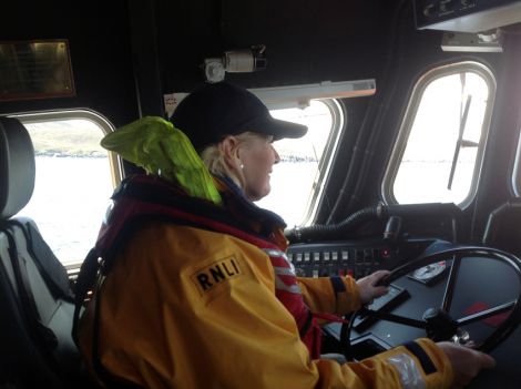 Jan takes a turn at the Aith lifeboat wheel.