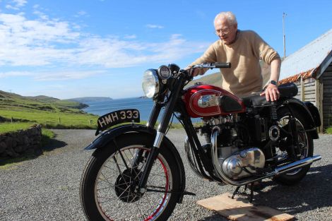 Jackie Edwardson with his old BSA A7 outside his Heylor home. Photo Shetnews