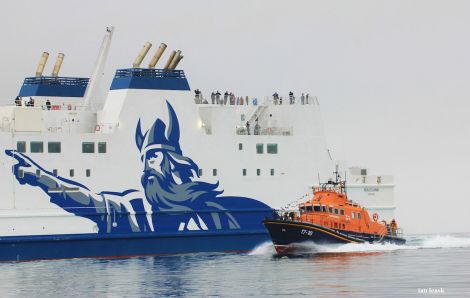 Chasing Magnus: Lerwick lifeboat and the NorthLink ferry Hjaltland during Saturday's open day in support of the RNLI - Photo: Ian leask