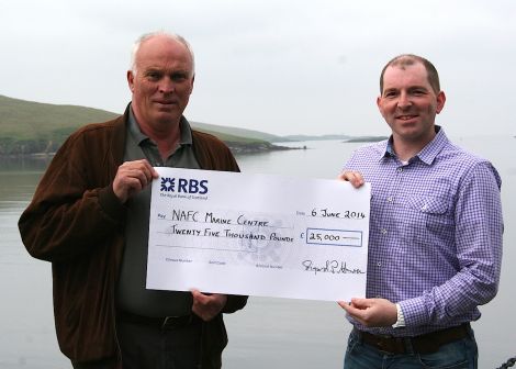 Grieg Seafood Hjaltland's MD Sigurd Petterson (left) with hatchery manager Gregg Arthur - Photo: NAFC Marine Centre