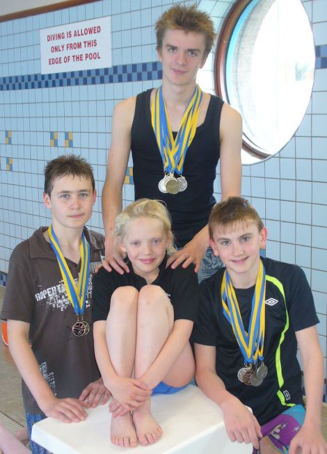 Four years ago with her fellow Delting Dolphins, Felix Gifford (standing), Iain Leach (left) and Logan Jamieson. Photo Lorraine Gifford