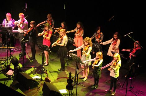 Eunice Henderson's group of young fiddlers will strut their stuff at the 60th Sidmouth Folk Week.