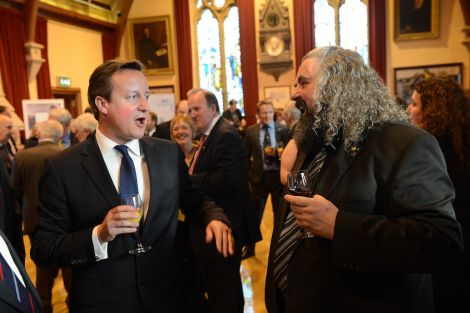 Prime Minister David Cameron in conversation with 2014 Lerwick Up Helly Aa guizer jarl Ivor Cluness in the town hall on Tuesday night.