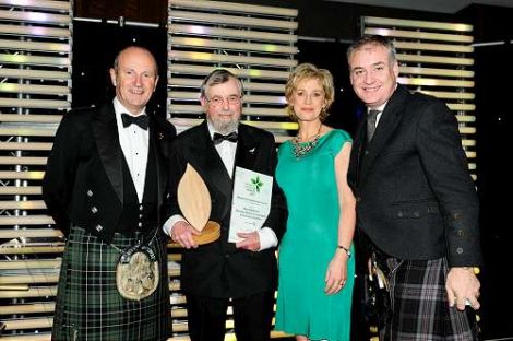 Nick Riddiford (second left) accepting the 2013 Scottish Marine Conservation Award from comedian Fred Macauley, TV presenter Sally Magnusson and Scottish environment secretary Richard Lochhead.