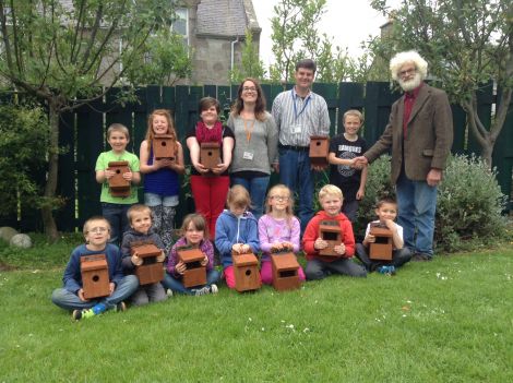 From left to right, top row: Ksawier Stefanski, Olivia Campbell, Mae Jamieson, Ashley Falconer (play practitioner), Kenny McIntosh (play assistant) Damian Anderson, James Mackenzie (Amenity Trust) Bottom row: Saul Ward, Oliwier Stefanski, Magda Grant, Lisa Goudie, Katrin Los, Magnus McGinley, Keenan Williamson. Photo: Katie Henderson