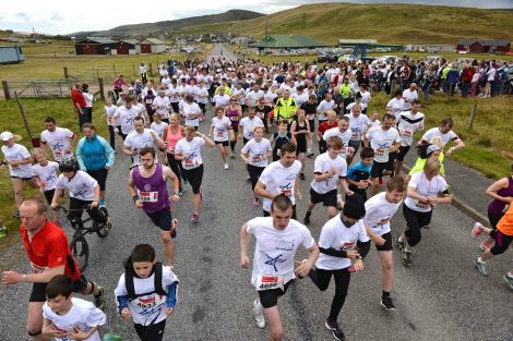 Participants at the start of Mind Your Head's fun run at Cunningsburgh on Sunday. Photo: Malcolm Younger