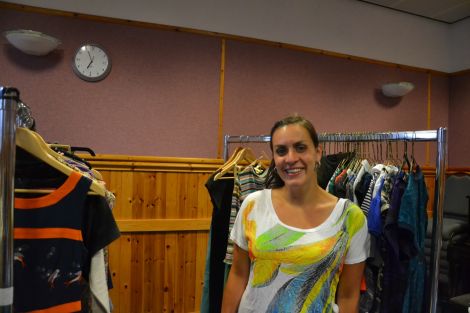 Annalie Irvine takes a break from organising racks of clothes for tomorrow's 'Sale for Syria' at Islesburgh. Photo: Shetnews