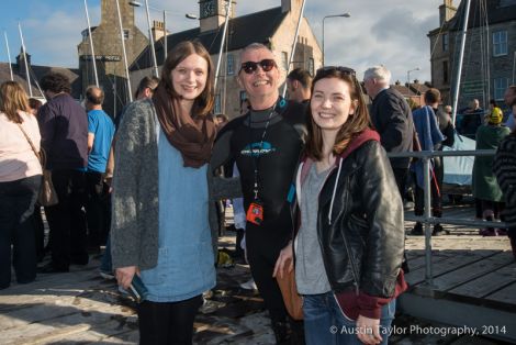 Stephen Gordon, aka Smirk, with his daughters Marianne and Ella following the swim. Photo: Austin Taylor 