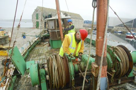 Volunteers Peter Chroston and Tim Senften working on the Nil Desperandum - Photo: Shetland Amenity Trust