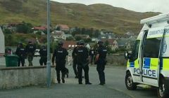 Armed police officers arriving at Westerloch Drive on Tuesday afternoon. Photo: Thomas Ewenson