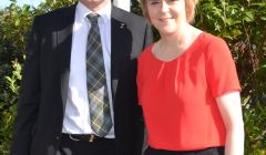 Nicola Sturgeon pictured with Highlands and Islands list MSP Mike Mackenzie during a visit to Shetland in August. Photo: Shetnews