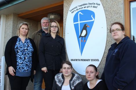 Angry members of the Urafirth parent council. From left: Clare Pottinger, Robin Sinclair, Pamela Ruddick, Liane Anderson, Charlene Johnston and Claire Herridge - Photo: Pete Bevington/Shetland News