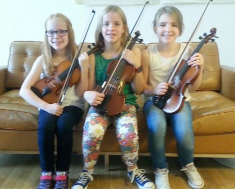 Fiddle talent. (From left) Jodie Smith, Jasmin Smith and Anya Johnston hoping to make it onto national TV at Tuesday's Britian's Got Talent auditions at Mareel.