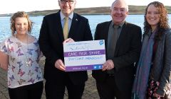 SIC leader Gary Robinson (second from left) and NHS Shetland chairman Ian Kinniburgh (third from left) with Scottish Youth Parliament members Catherine Hannah (left) and Kaylee Mouat (right). Photo courtesy of SIC.