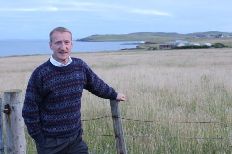 Tavish Scott - pictured in Hillswick last year - wants the SIC to scrap school closures.