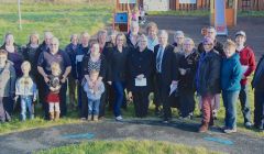 Mike MacKenzie meeting the Urafirth community at the weekend. He wants school closures taken off the agenda for five years. Photo: Shetnews