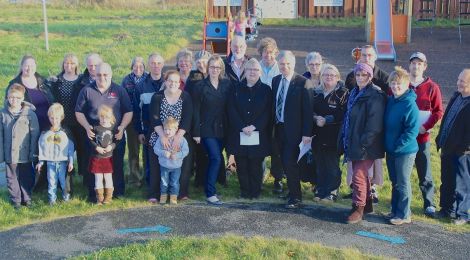 Mike MacKenzie meeting the Urafirth community at the weekend. He wants school closures taken off the agenda for five years. Photo: Shetnews