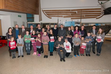 Iain Gulland (centre) with the winners of this year's Shetland Environmental Awards at the Shetland Museum and Archives on Wednesday - Photo: Austin Taylor