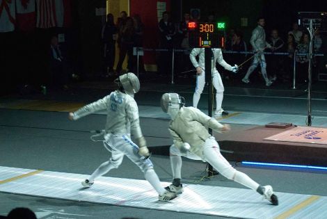 Stephen Rocks (left) cam third in men's sabre event.