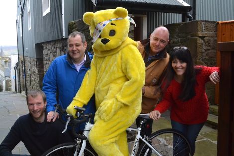 Getting into gear BBC Radio Shetland's biggest night are (from left): Richard Forbes, John Johnston, Pudsey, Mike Grundon and Jane Moncrieff. Now where is Daniel Lawson?