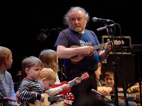 Brian Nicholson leads a group of ukulele-wielding youngsters on Saturday night. Photo: Chris Brown