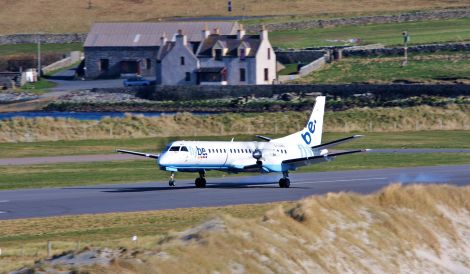 A Loganair plane touching down at Sumburgh airport - Photo: Ronnie Robertson