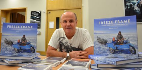 Wildlife photographer Doug Allan at Mareel with copies of his new book Freeze Frame. Photo Shetland News