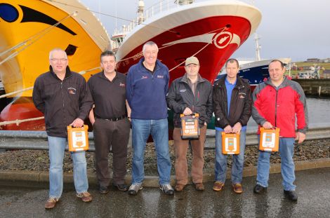 The training team visited Whalsay to carry out training last week. From left: John Ellis, Ross Cowie, Neil Campbell, Jimmy Tulloch (Charisma), Hamish Corrigall and William Polson (mate on the Charisma).​