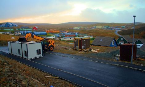 This portacabin at Staney Hill, in Lerwick, was unable to stand the strength of the wind on Monday afternoon. A JCB Loadall is keeping it from going any further - Photo: Nate Bryant