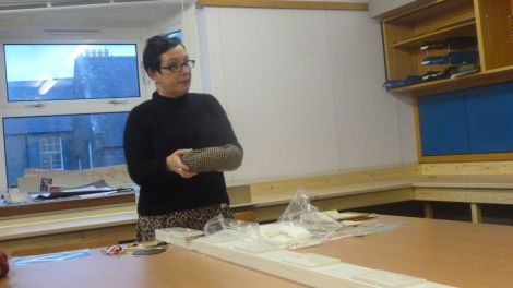 Shetland Museum's collections curator Jenny Murray speaking about Magnus Christie. She is holding his hat, which his mother kept a hold of after he was killed at the Ancre in November 1916.