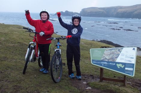 Joshua Painter and Kieran Brown at the Banks of Funzie after cycling 7.5 miles for the Water Aid charity.