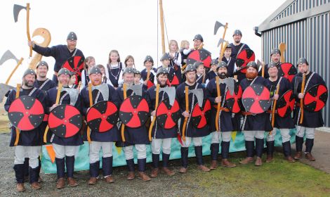 Guizer jarl Malvyn Clark with his squad of 15 Vikings, seven boys and eight princesses.