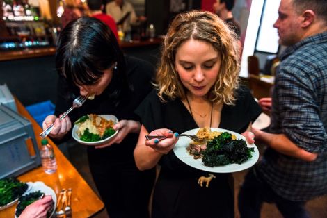 Shetland Night in London organiser Helen Nisbet tucking in to some mutton and seaweed pie and kale. Photo: Joe Plommer.