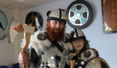 Guizer Jarl Alan Jamieson, aka Kveldulf Bjalfason, with his 11 year old eldest son Fraser at Brae primary department on Friday morning. Photo Shetnews