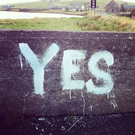 A bridge in Walls has borne a faded slogan reading 'Vote Liberal' for decades. Last summer a pro-indy campaigner added their own slogan. Photo: Floortje Robertson