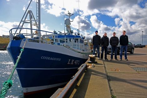 The Courageous with her new owners (from left): Christopher Irvine, skipper Ian Shearer, Malcolm Reid and James Johnson. Photo Ivan Reid