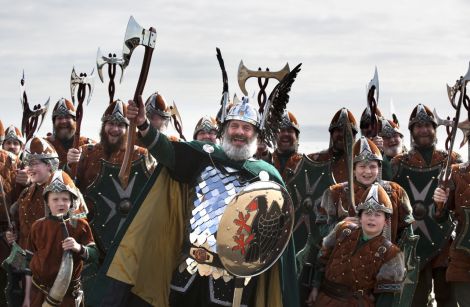 Guizer Jarl Neil Robertson and his squad in good spirits at Aberdeen beach on Wednesday.