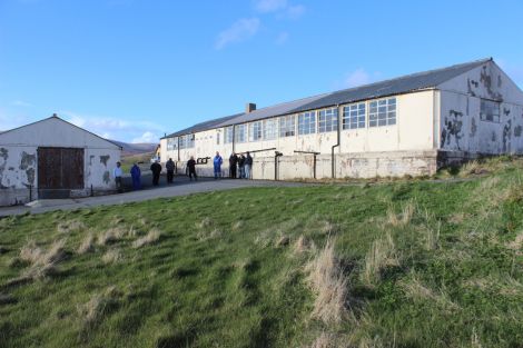 The former school canteen used as a galley shed (left) and the main old school building in need of major repairs. Photo Shetnews.