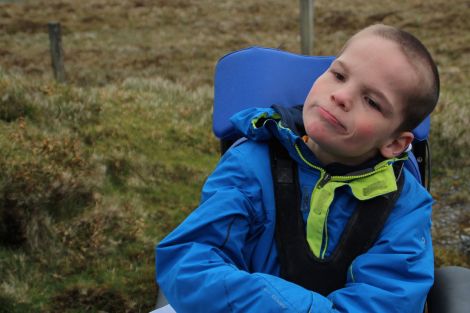 Ryan sitting in his wheelchair 1,000 feet up on the summit of Fitful Head - all Photos: Liam Brannan