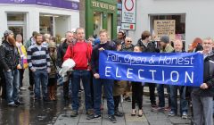 Protesters gather at Lerwick's Market Cross on Saturday - Photos: ShetNews