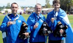 Leon Johnson, Matthew Cox and Bobby Bristow celebrating their silver medal in the team's half marathon - Photo: Maurice Staples