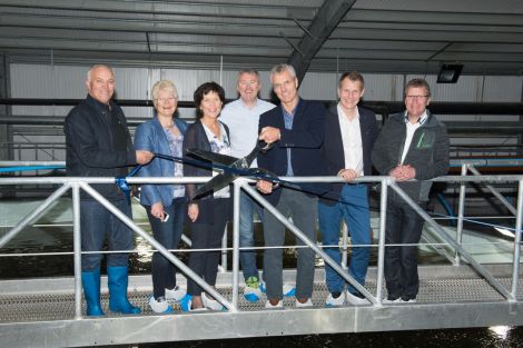 Per Greig Jnr cutting the ribbon to officially open the £15.5 million new Girlsta hatchery. Photo: Millgaet Media