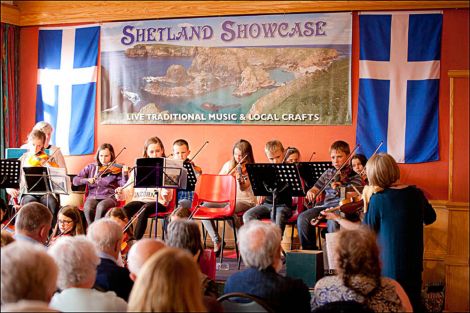 The Scandi Sessions fiddlers, a group put together by tutors Eunice Henderson and Debbie Scott, on stage at Islesburgh on Monday night. Photo: Dale Smith