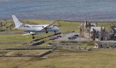 John Moncrieff's stunning image used by the Facebook campaign of a Loganair/Flybe Saab 340 above Sumburgh Hotel, where campaigners met Loganair bosses on Thursday evening.