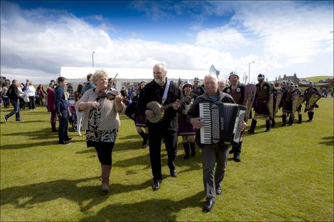 There was live music throughout the day in sunny Sandwick. Photo: Dale Smith