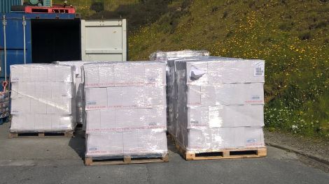 Some of the 11 pallets of Shetland's favourite rum on the tarmac at Hughson Brother's Lerwick warehouse prior to being shipped out to shops throughout the isles.