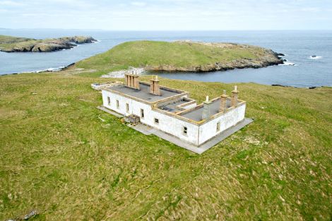 Two dilapidated former lighthouse keepers' houses require some major investment to become inhabitable again.