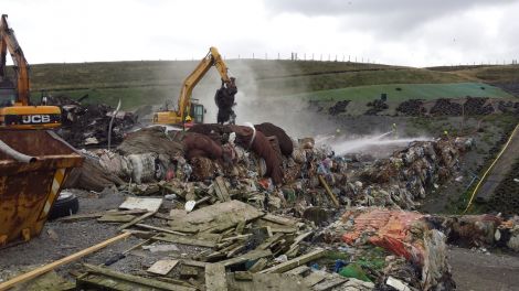 Steam coming from the pile of rubbish which caught fire at the Rova Head landfill site on Tuesday morning. Photo courtesy of SIC.